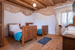 Postel nebo postele na pokoji v ubytování Holiday house Meri