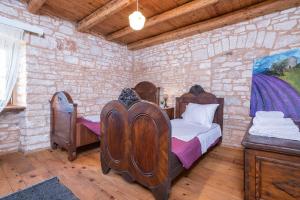 Postel nebo postele na pokoji v ubytování Holiday house Meri