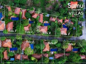 a plan of a neighborhood with houses and trees at Samui Secret Villas in Choeng Mon Beach