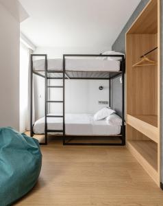 Postel nebo postele na pokoji v ubytování Hotel Forum Ceao