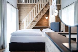 Posteľ alebo postele v izbe v ubytovaní Hotel Ciasa Tamá