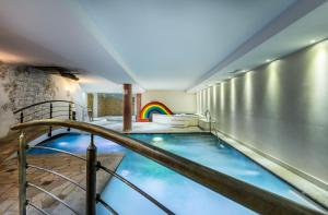 Bazén v ubytovaní Hotel Ciasa Tamá alebo v jeho blízkosti