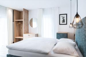 Posteľ alebo postele v izbe v ubytovaní Hotel Ciasa Tamá