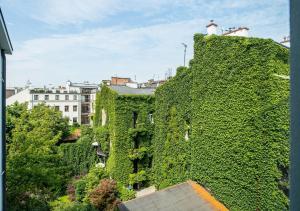 Vonkajšia záhrada v ubytovaní Aparthotel Cracovia Residence