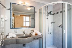Kúpeľňa v ubytovaní Hotel Ciasa Tamá
