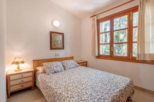 Postel nebo postele na pokoji v ubytování Villa Costa De Blanes