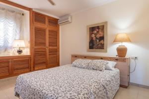 Postel nebo postele na pokoji v ubytování Villa Costa De Blanes