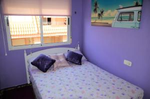 Postel nebo postele na pokoji v ubytování Naufragos Beach Apartment