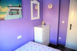 Postel nebo postele na pokoji v ubytování Naufragos Beach Apartment