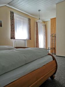 Postel nebo postele na pokoji v ubytování Pension Marcus