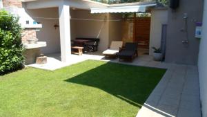 Vonkajšia záhrada v ubytovaní Apartment Floresita