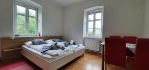 Posteľ alebo postele v izbe v ubytovaní Appartements Maximilian