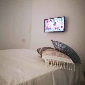 Postel nebo postele na pokoji v ubytování Sorrento Mandala Home