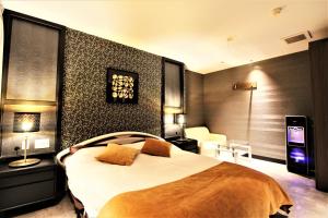 Letto o letti in una camera di Hotel Riviera Sagamihara (Adult Only)