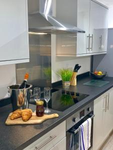 Kuchyň nebo kuchyňský kout v ubytování The Barbican Apartments