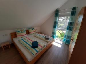 Ένα ή περισσότερα κρεβάτια σε δωμάτιο στο Ferienhof Hummer
