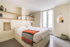 Кровать или кровати в номере Les Residences - Gambey