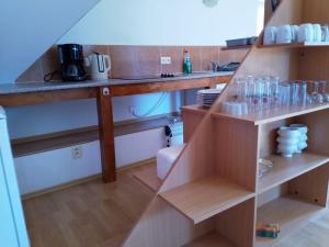 Kuchyň nebo kuchyňský kout v ubytování Camping & Guest House Pliskovice
