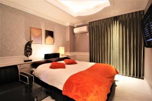 Letto o letti in una camera di Hotel Riviera Sagamihara (Adult Only)