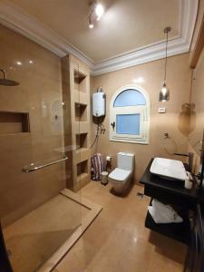 Ванная комната в Sunny Studios in New Cairo