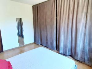 Postel nebo postele na pokoji v ubytování Gite libecciu