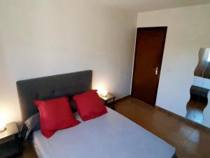 Postel nebo postele na pokoji v ubytování Gite libecciu