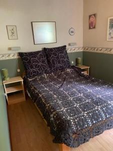 Säng eller sängar i ett rum på Fritidshus i Sandbergen