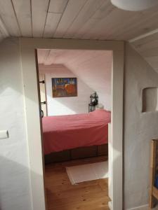 Postel nebo postele na pokoji v ubytování Vakantiewoning De Wilg - rustig gelegen