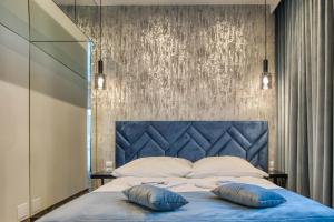 Postel nebo postele na pokoji v ubytování Hotel & Spa Biały Dom