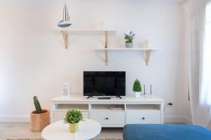 TV a/nebo společenská místnost v ubytování Vela