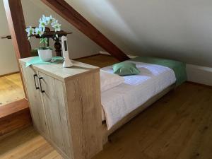 מיטה או מיטות בחדר ב-Villa Ruska dača