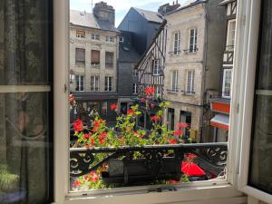 a view from a window of a city at L'Appartement R Postel (4/6 Pers) in Honfleur