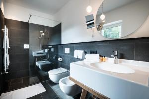 Kúpeľňa v ubytovaní Hotel Ciasa Tamá