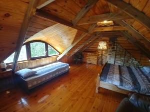 Postel nebo postele na pokoji v ubytování Stary Spichlerz nad Wartą
