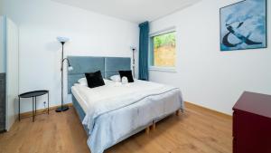 Posteľ alebo postele v izbe v ubytovaní Apartamenty EverySky - Wyspiańskiego 4