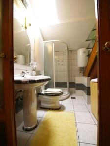 Kúpeľňa v ubytovaní Famous Promenade Riva Apartment + 25 fotografií