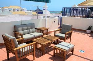 Balkón nebo terasa v ubytování Naufragos Beach Apartment