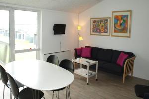 A seating area at Lyngby Mølle Holiday Apartment