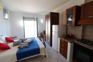 Køkken eller tekøkken på Casa vacanze Frida in Salento