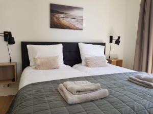 Кровать или кровати в номере Vakantiehuis Huisje 31 Zoutelande