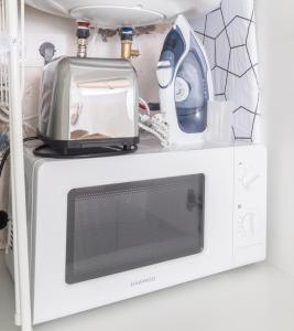 A kitchen or kitchenette at Sugar Beach Boutique Studio