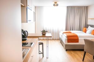 Afbeelding uit fotogalerij van bodenseezeit Apartmenthotel Garni in Lindau