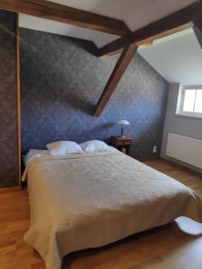 Cama o camas de una habitación en Mooste mõisa Linakoja külalistemaja