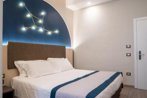 A bed or beds in a room at San Lorenzo - Boutique Hotel & SPA