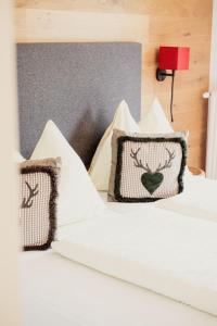 Łóżko lub łóżka w pokoju w obiekcie Hotel Aberseehof