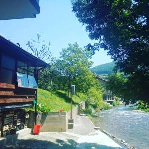 a view of a river next to a house at Silent home in Visoko +37 photos