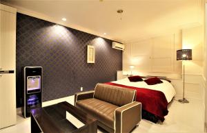 Letto o letti in una camera di Hotel Riviera Sagamihara (Adult Only)