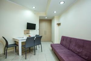 A television and/or entertainment centre at Vasso Apartments 3