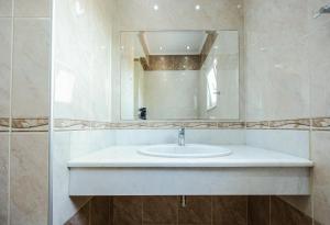 A bathroom at Vasso Apartments 3