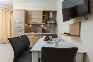 A kitchen or kitchenette at Vasso Apartments 3